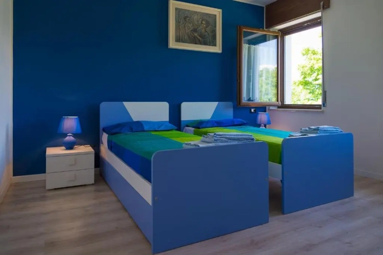 Standard Triple room with garden view
