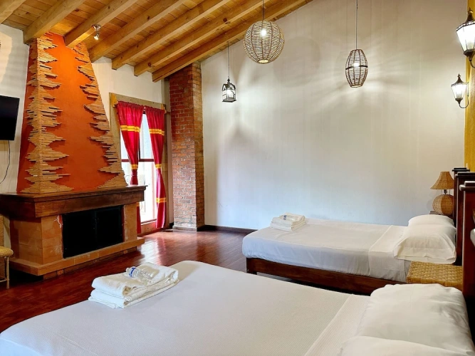 Deluxe Quadruple room with courtyard view