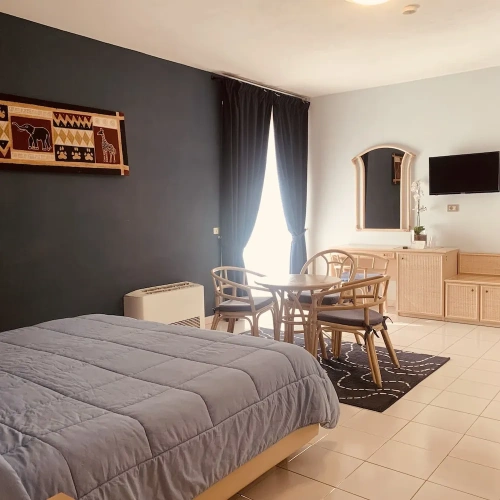 Deluxe Triple room with balcony and with pool view