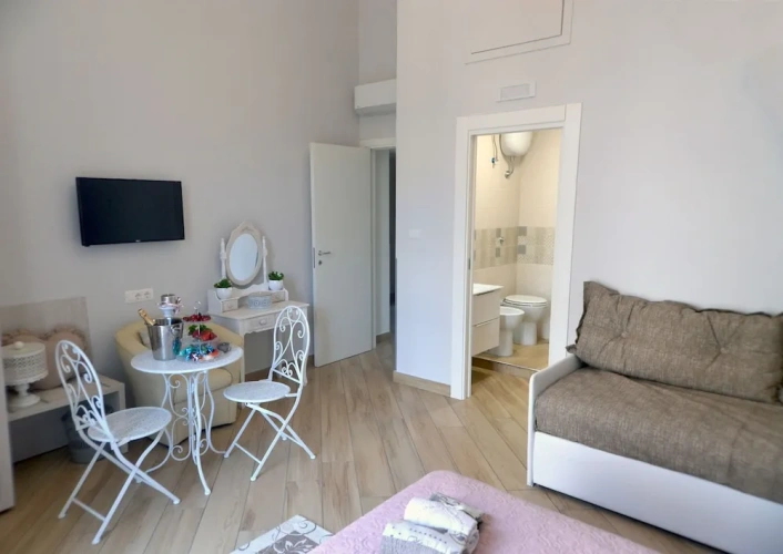 Standard Quadruple room with balcony and with city view