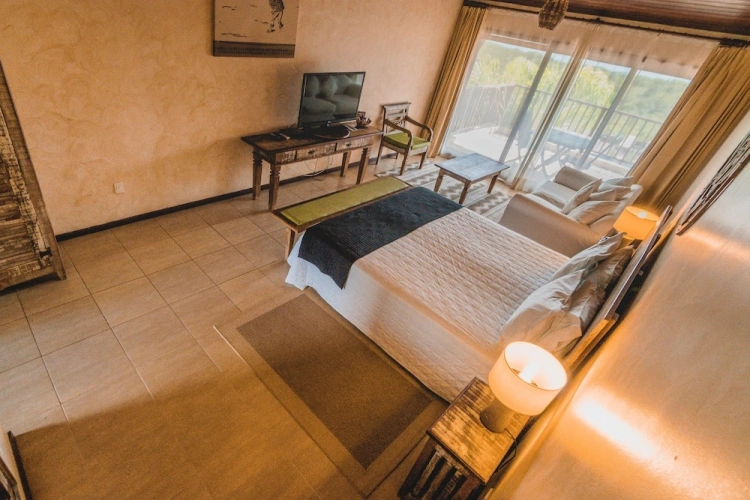 Triple Suite with balcony and with garden view