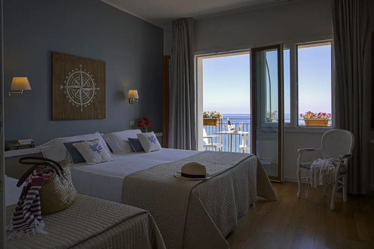 Superior Triple room with balcony and with sea view