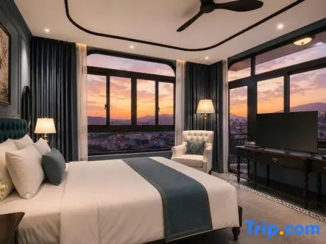 Standard room with balcony and with sunset view