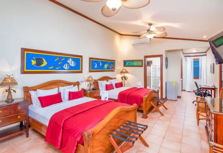 Standard Quadruple room with garden view