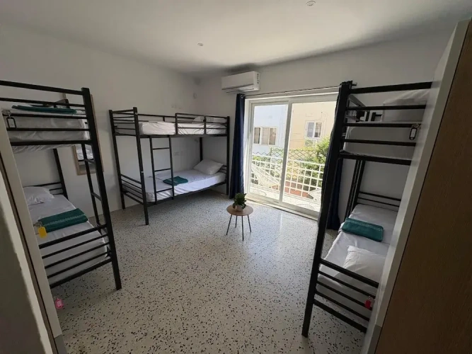 Bed in Dorm with balcony and with garden view