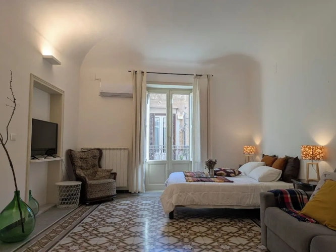 Standard Quadruple room with balcony and with city view