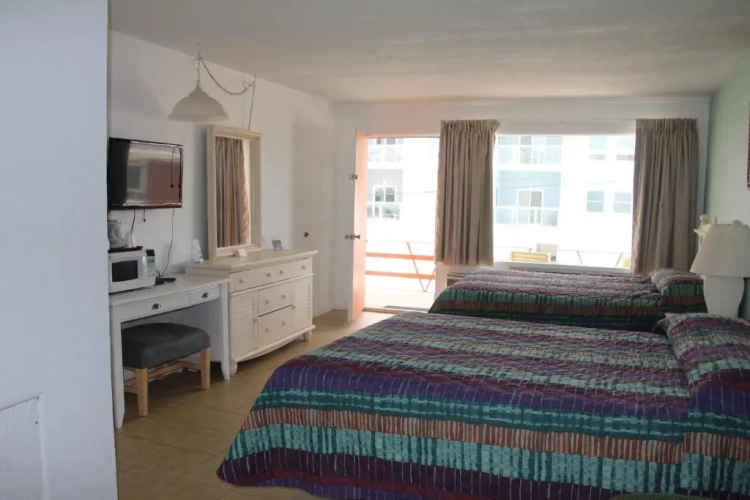 Deluxe Quadruple room with balcony and with sea view
