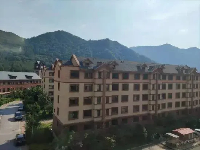 Benxi Huamu Hefu Warm Apartment