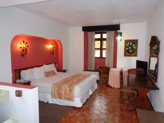 Classic Quadruple room with garden view