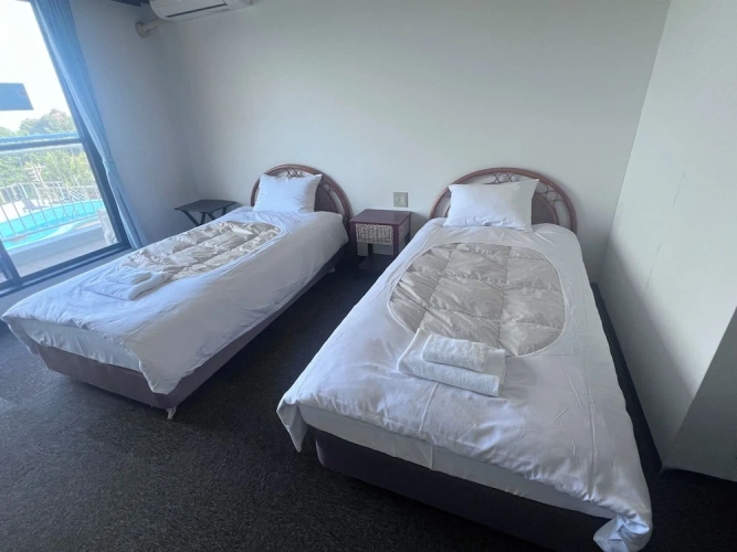 Economy Twin room with partial ocean view