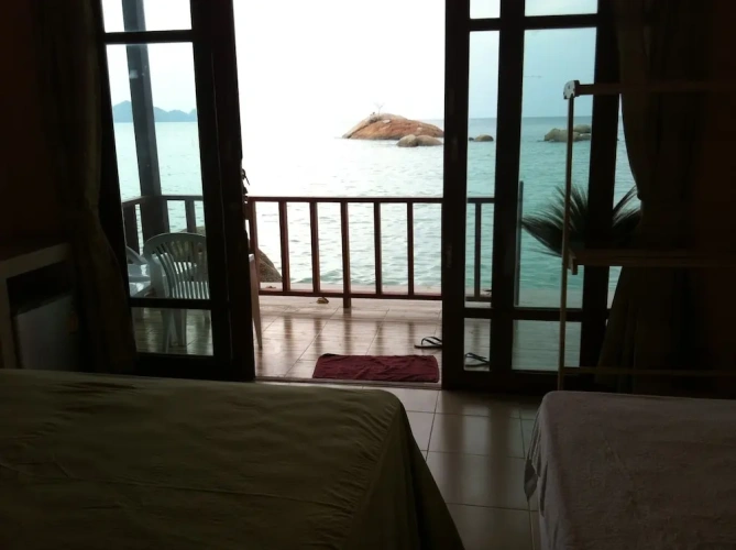 Standard room with balcony and seafront