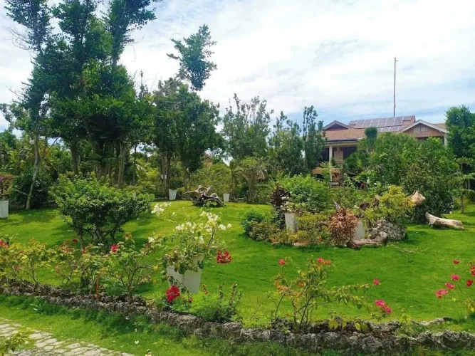 Superior Triple room with balcony and with garden view