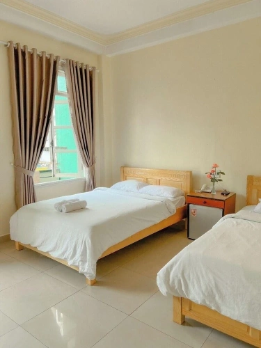 Standard Quadruple room with city view