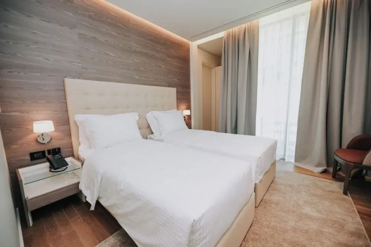 Standard Twin room with balcony and with courtyard view