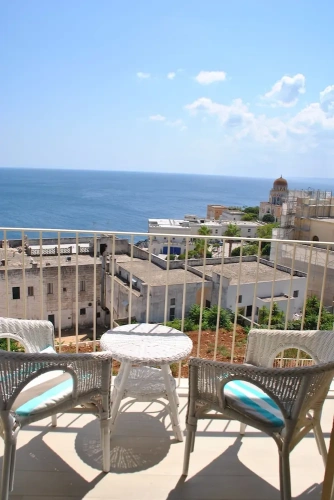 Superior Triple room with balcony and with sea view