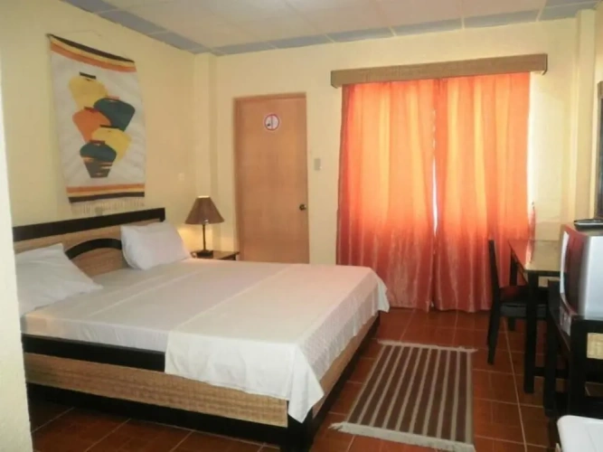 Standard room with balcony and beachfront
