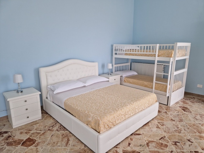 Deluxe Quadruple room with balcony and with sea view