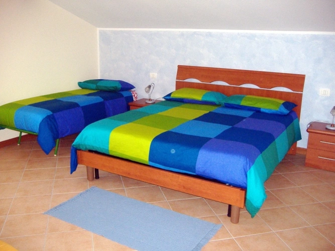 Deluxe Quadruple room with balcony