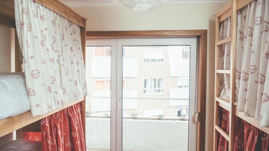 Bed in Dorm with balcony