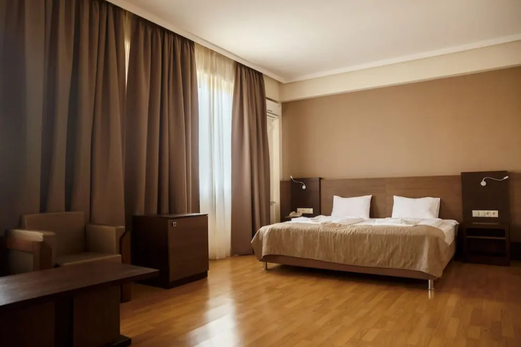 Olympus Hotel By Umbrella