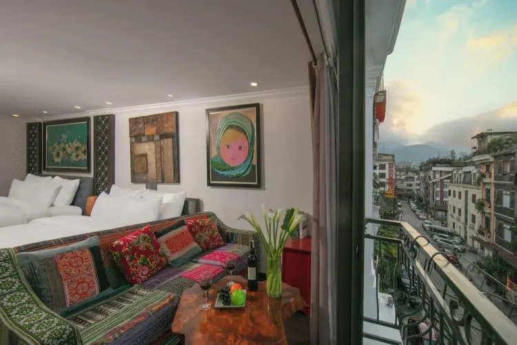 Deluxe Quadruple room with balcony