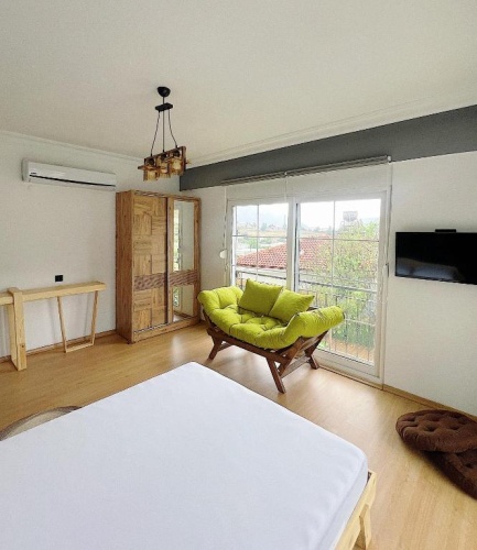 Standard Triple room with garden view