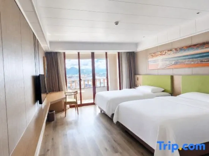 Deluxe Twin room with balcony and with sunrise view