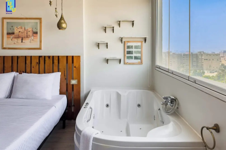 Xuru Stays I Jacuzzi Studios @ The Pyramids