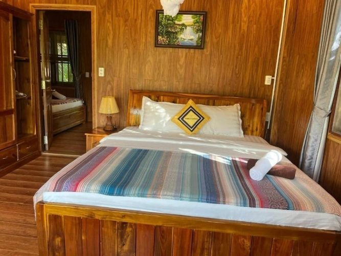 Standard Quadruple room with balcony and with garden view