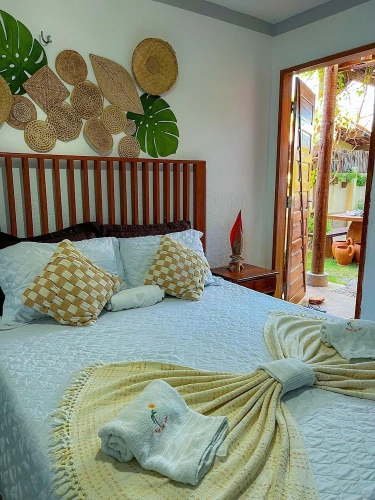Standard Triple room with courtyard view