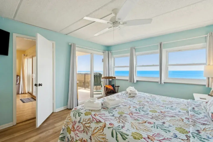 Oceanfront Beach Condo with Private Balcony, Short Walk to Pool and Beach by RedAwning