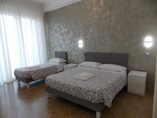 Deluxe Triple room with balcony and with sea view