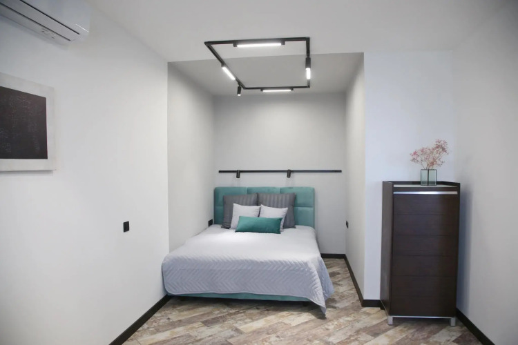 Фотография номера квартиры Апартаменты Малевич - мята, лаванда и горький шоколад в интерьере