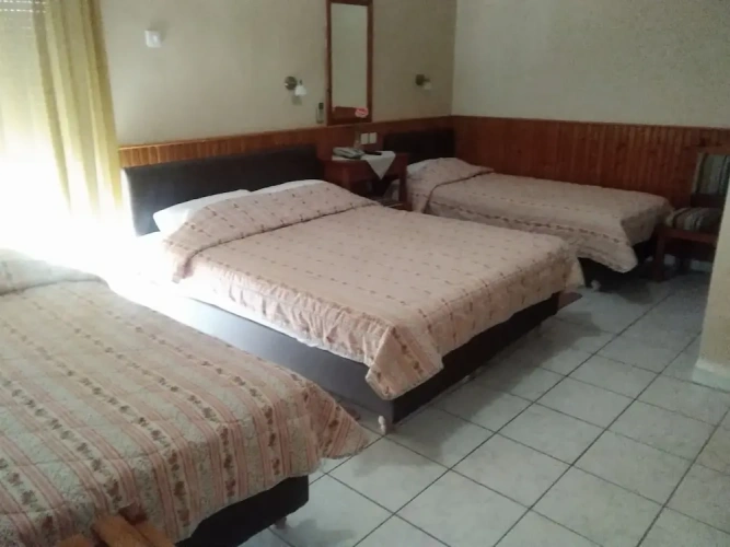 Standard Triple room with balcony and with partial sea view