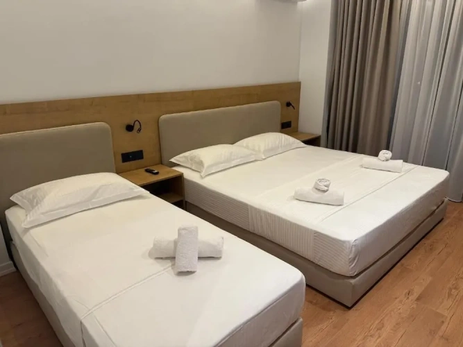 Economy Triple room with balcony and with garden view