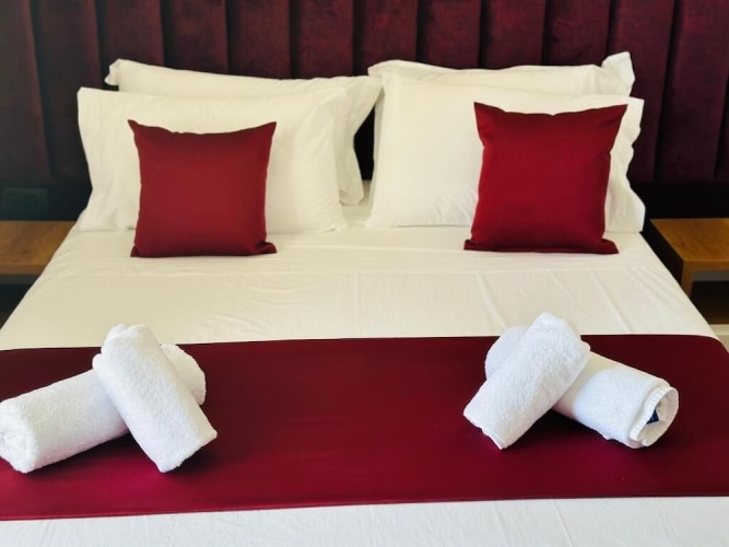 Classic Triple room with balcony and with garden view