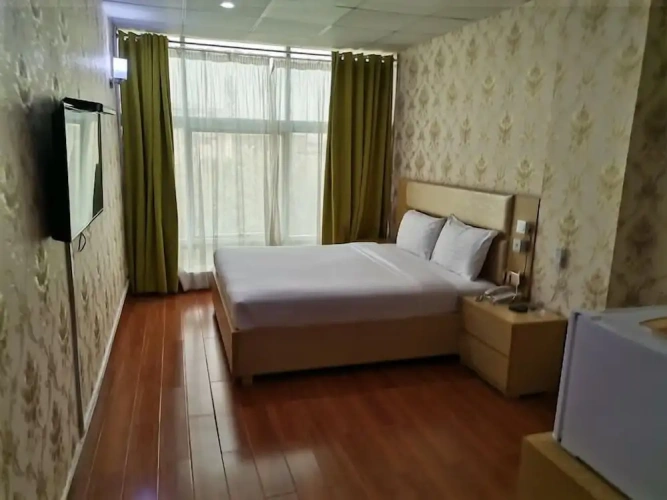 Deluxe Quadruple room with city view