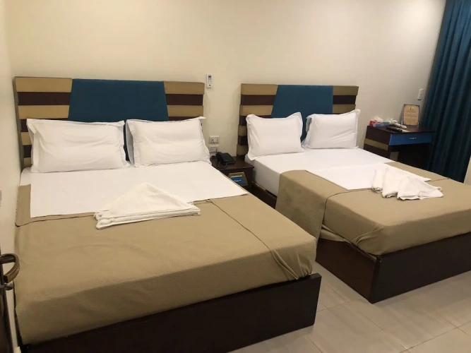 Deluxe Pyramids View Quadruple room with balcony