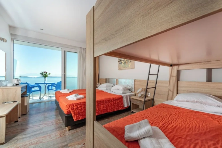 Standard Quadruple Family room with balcony and with sea view