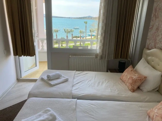 Standard Triple room with balcony and with sea view