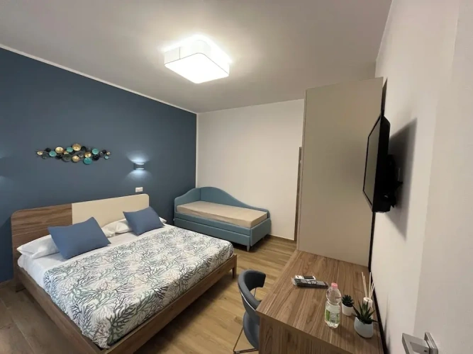 Standard Quadruple room with balcony and with city view