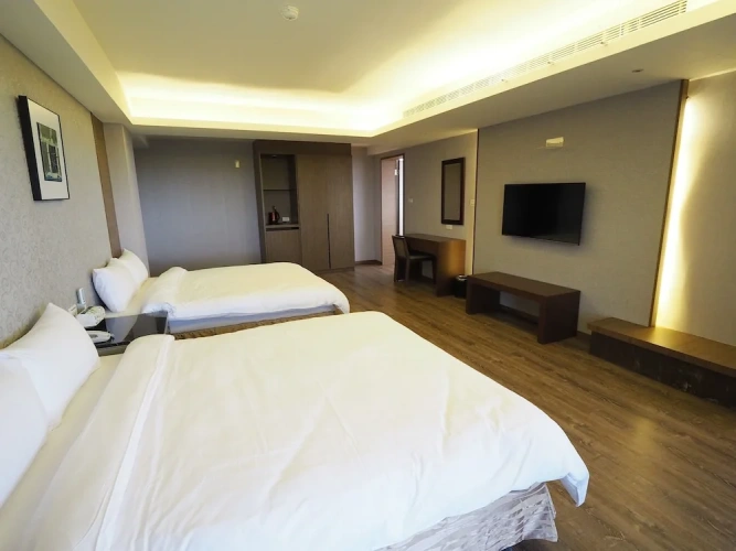 Deluxe Quadruple room with balcony
