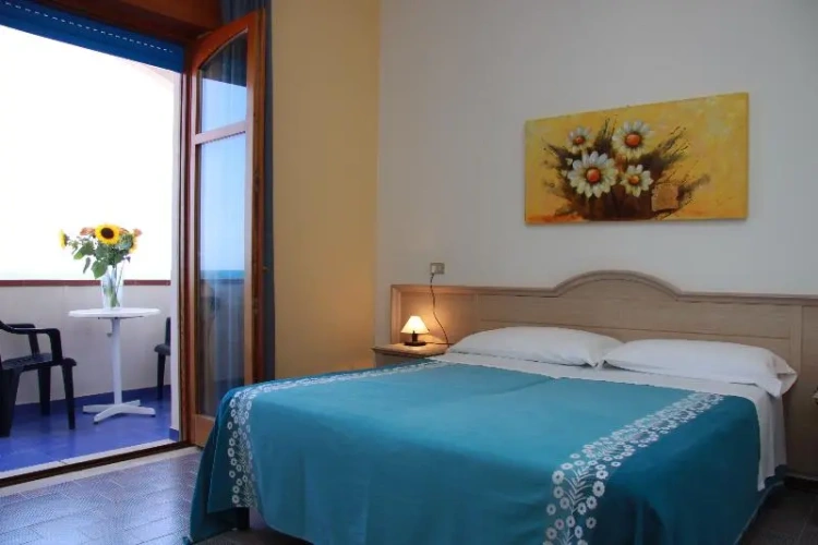 Standard Quadruple room with balcony and with sea view