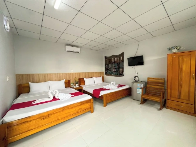 Executive Quadruple room with garden view