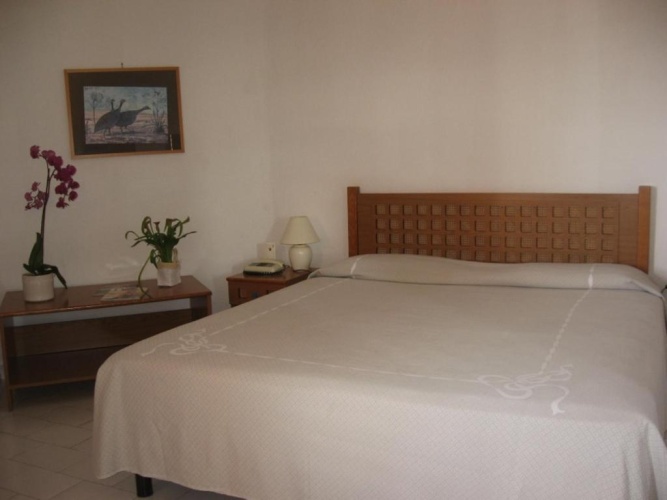 Standard Triple room with garden view