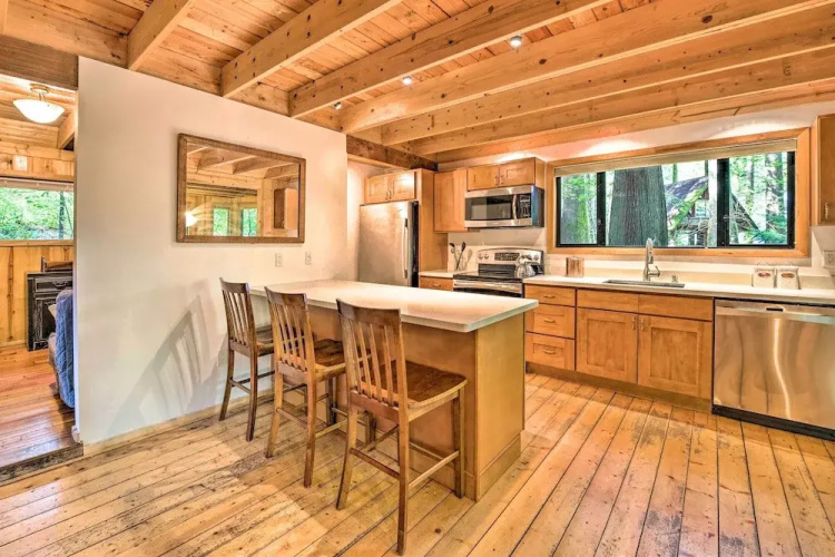 Three Enchanting Riverfront Cabins: Hot Tub Access