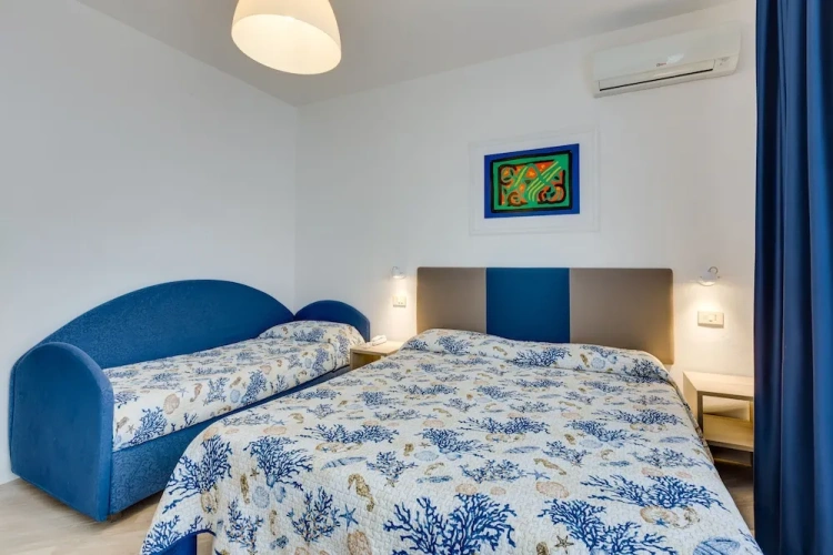 Comfort Quadruple room with balcony and with city view