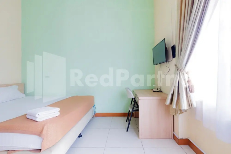 Wisma Anggrek Syariah Mitra Reddoorz