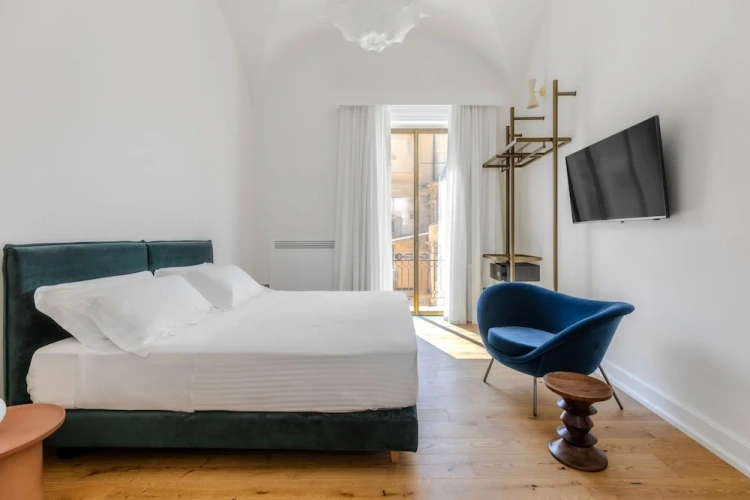 Comfort room with balcony and with city view