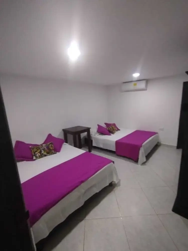 Deluxe Quadruple room with balcony and beachfront